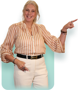 Smiling woman in striped blouse and white pants pointing to the right