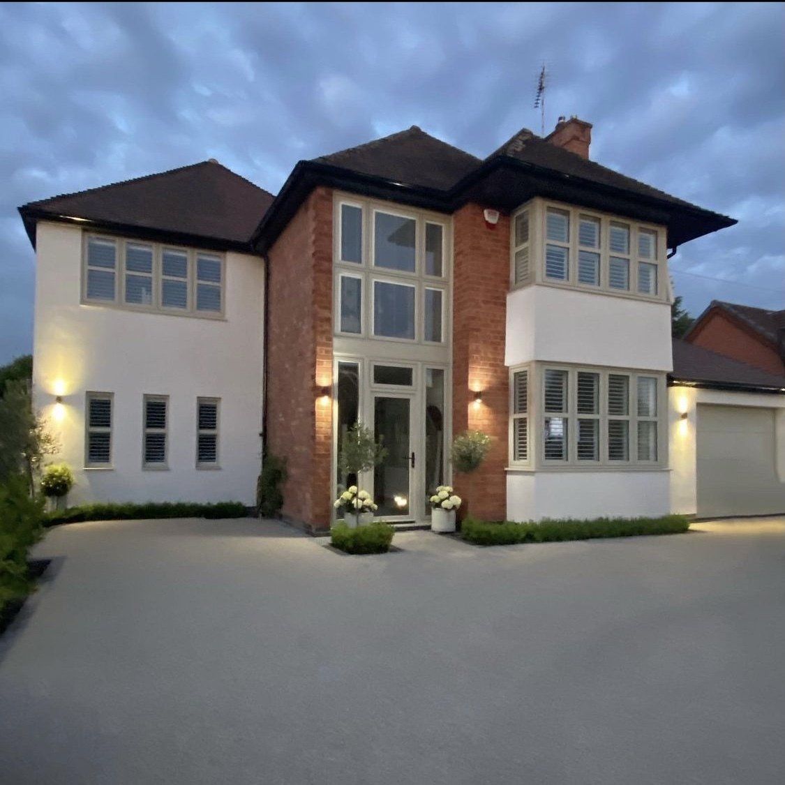 black frame windows and black door