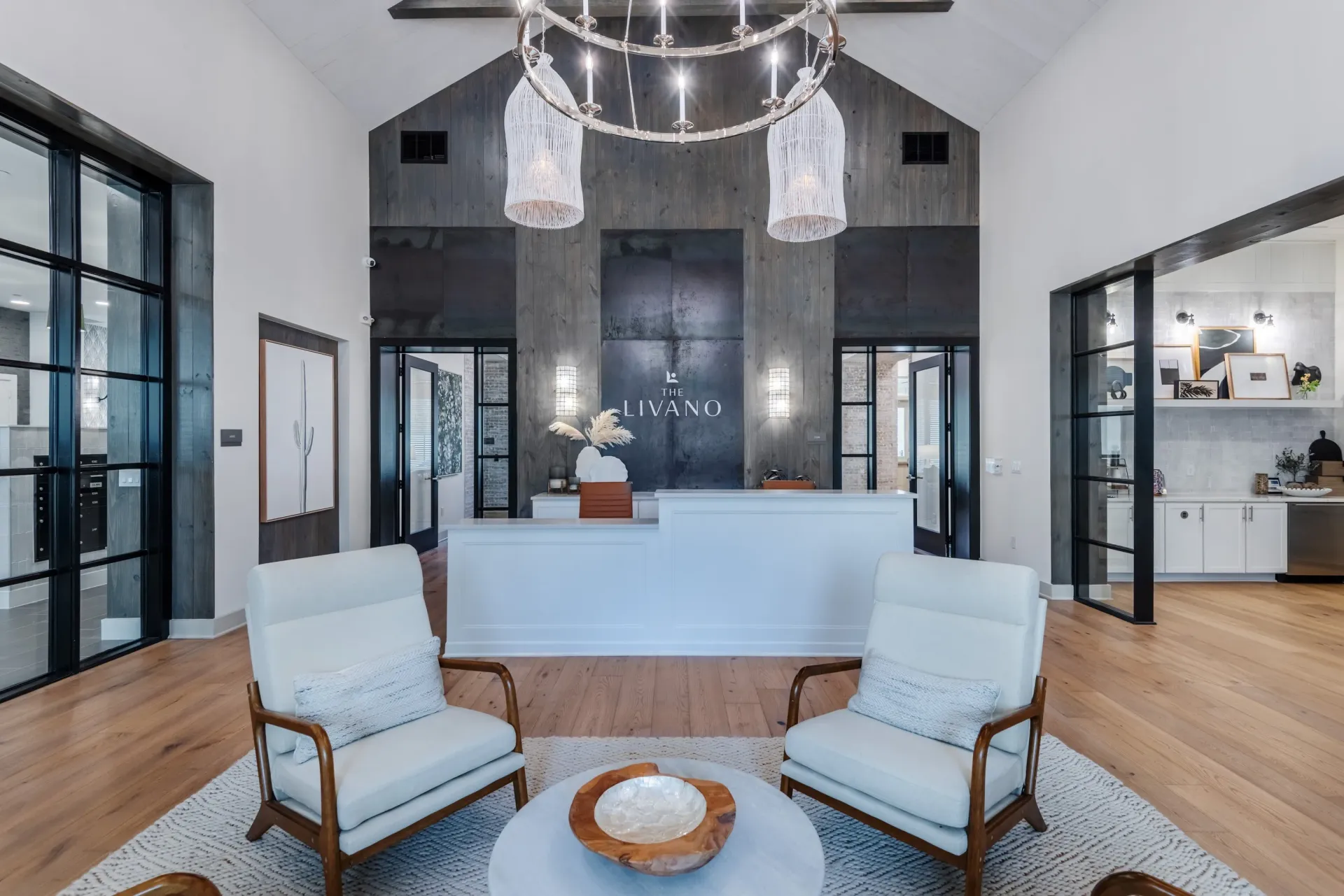 LIVANO property lobby with modern seating and reception desk.