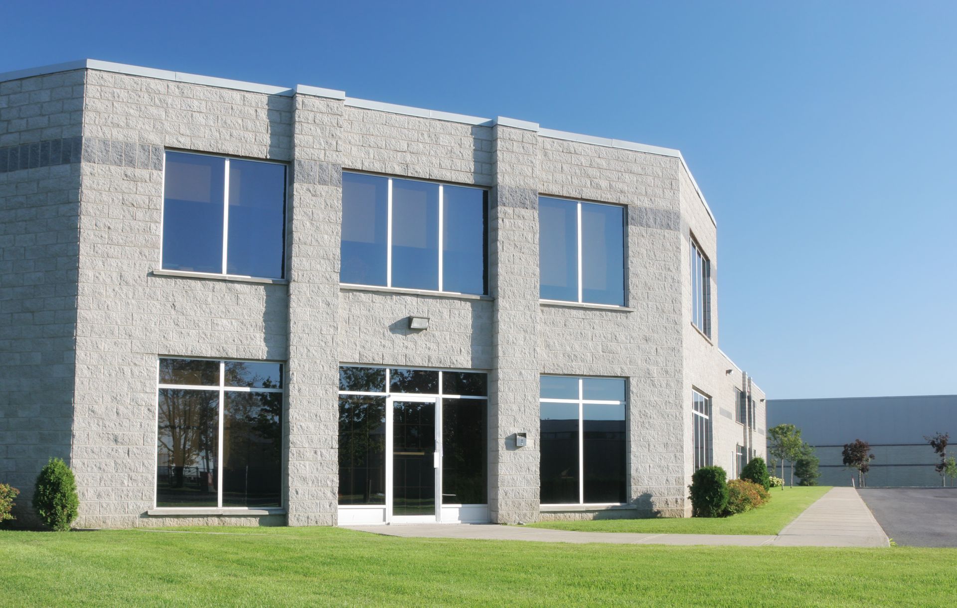A large brick building with a lot of windows