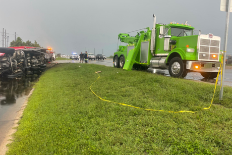flipped truck on interstate