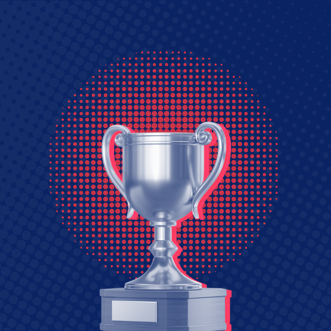 A silver trophy is sitting on a pedestal on a blue background.