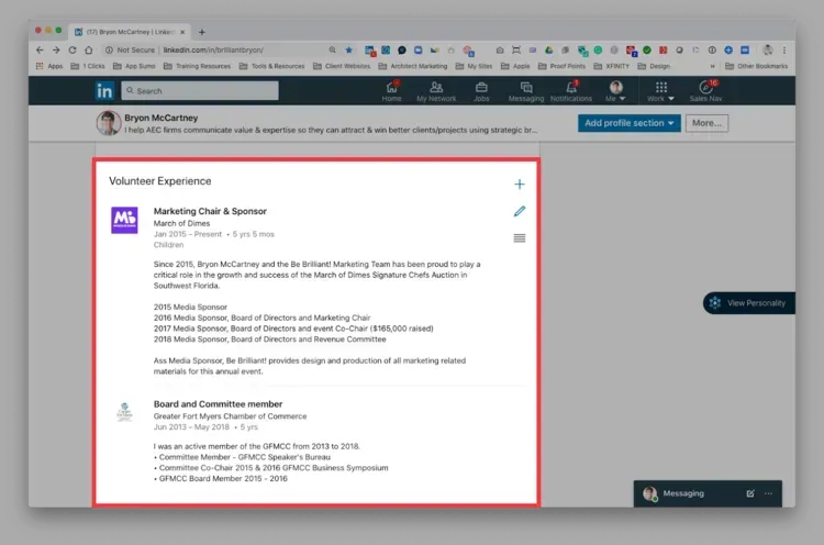 A computer screen shows a person 's linkedin profile