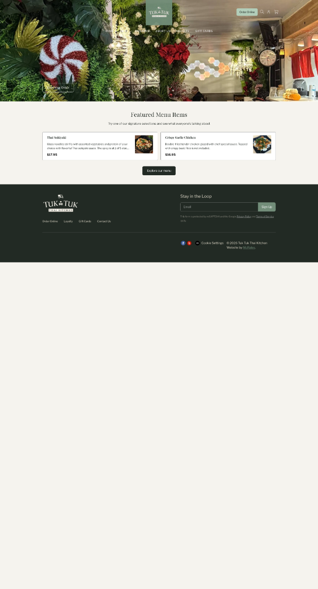 Homepage screenshot of a festive holiday-themed website with green accents, hero banner, and navigation cards