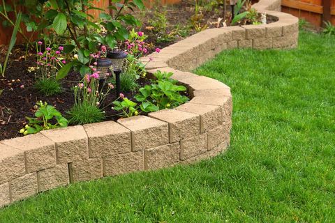 Stone Wall with Perfect Grass Landscaping — Gresham, OR — Classic Irrigation Stone Wall with Perfect Grass Landscaping — Gresham, OR — Classic Irrigation