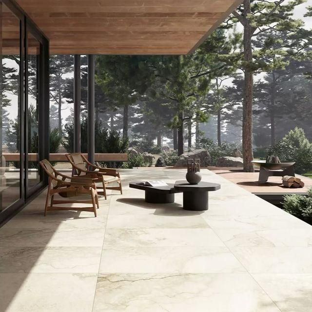 A Patio with Chairs and A Table with A Book on It — Peninsula Tiles in Umina Beach, NSW