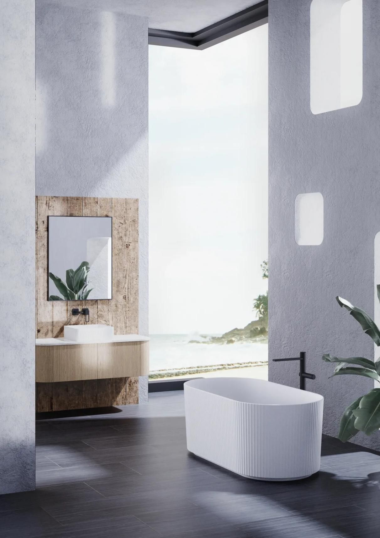 A Bathroom with A Bathtub, Sink, Mirror and Window — Peninsula Tiles in Umina Beach, NSW