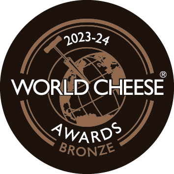 Um distintivo de bronze do prêmio mundial de queijos para 2023-24