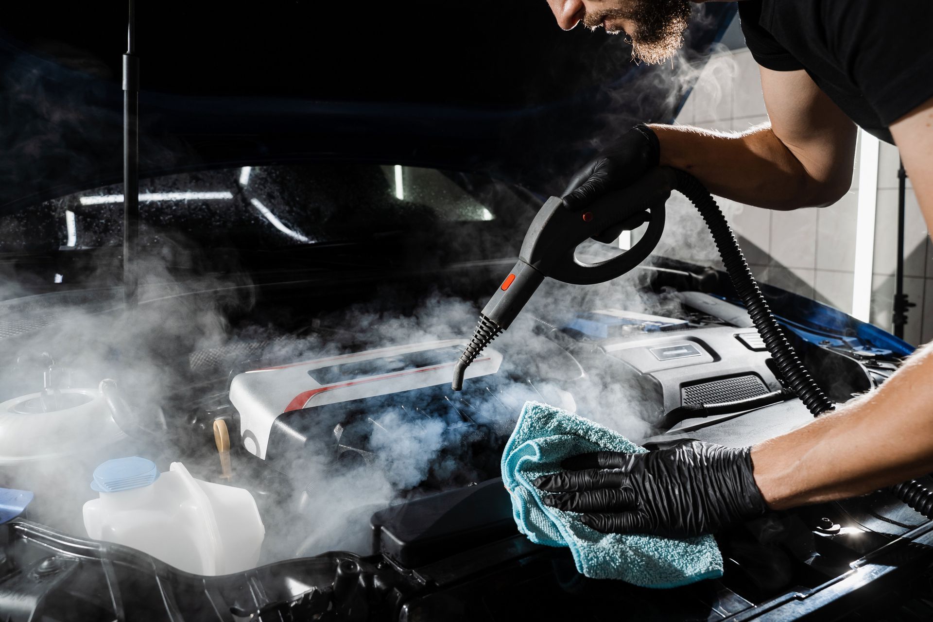 ENGINE STEAM CLEANING