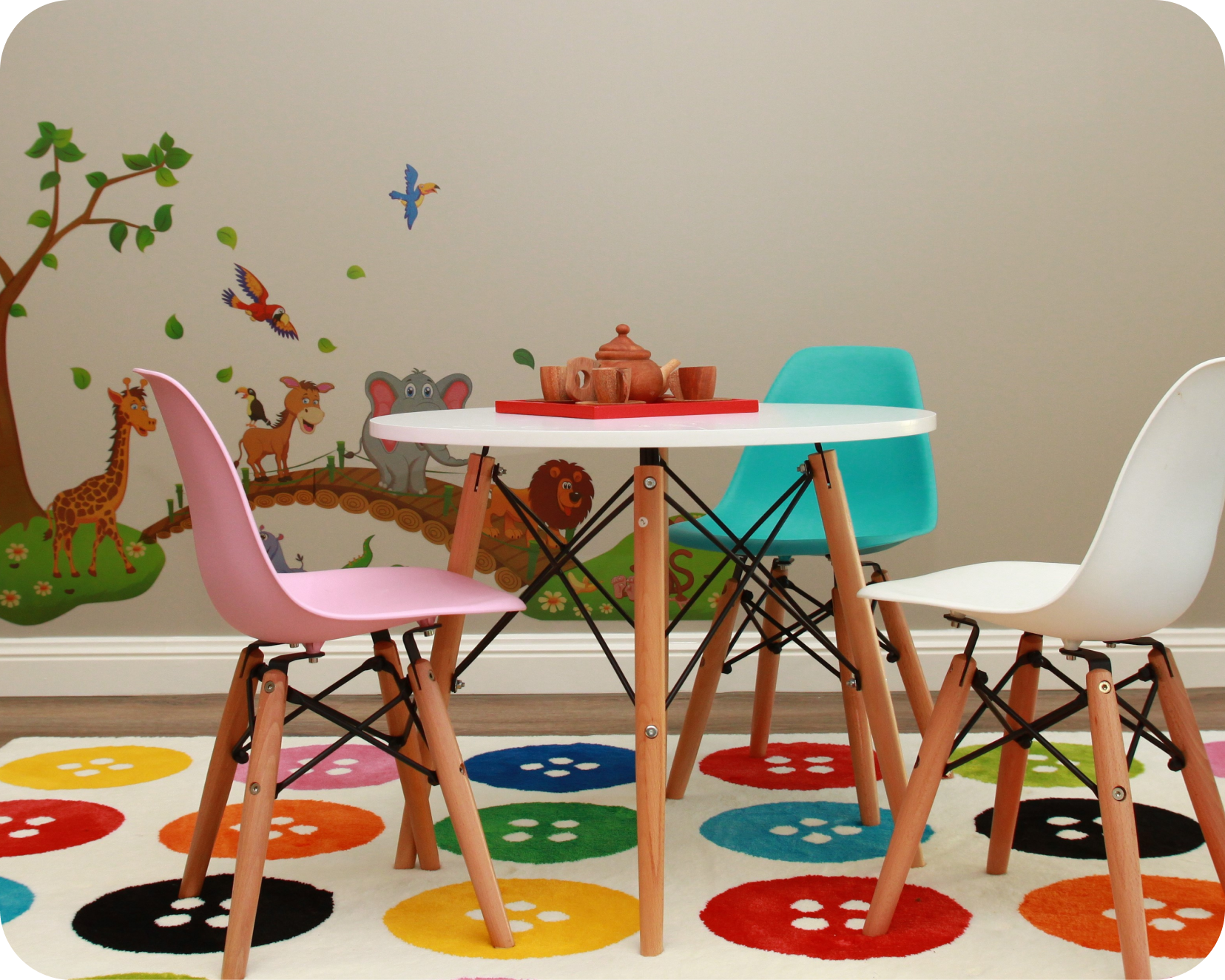 Outdoor play area with tricycles at Kinder Academy