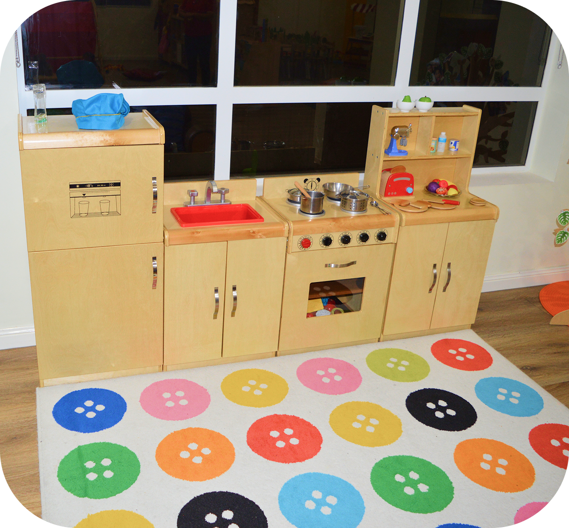 Indoor play area with soft play equipment at Kinder Academy