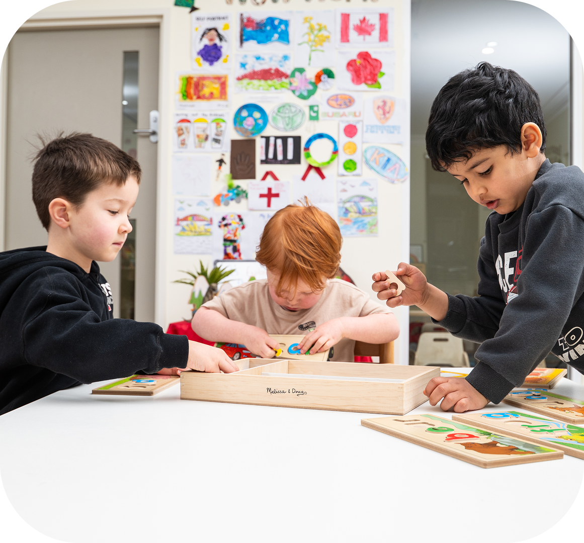 Children enjoying educational activities at Kinder Academy