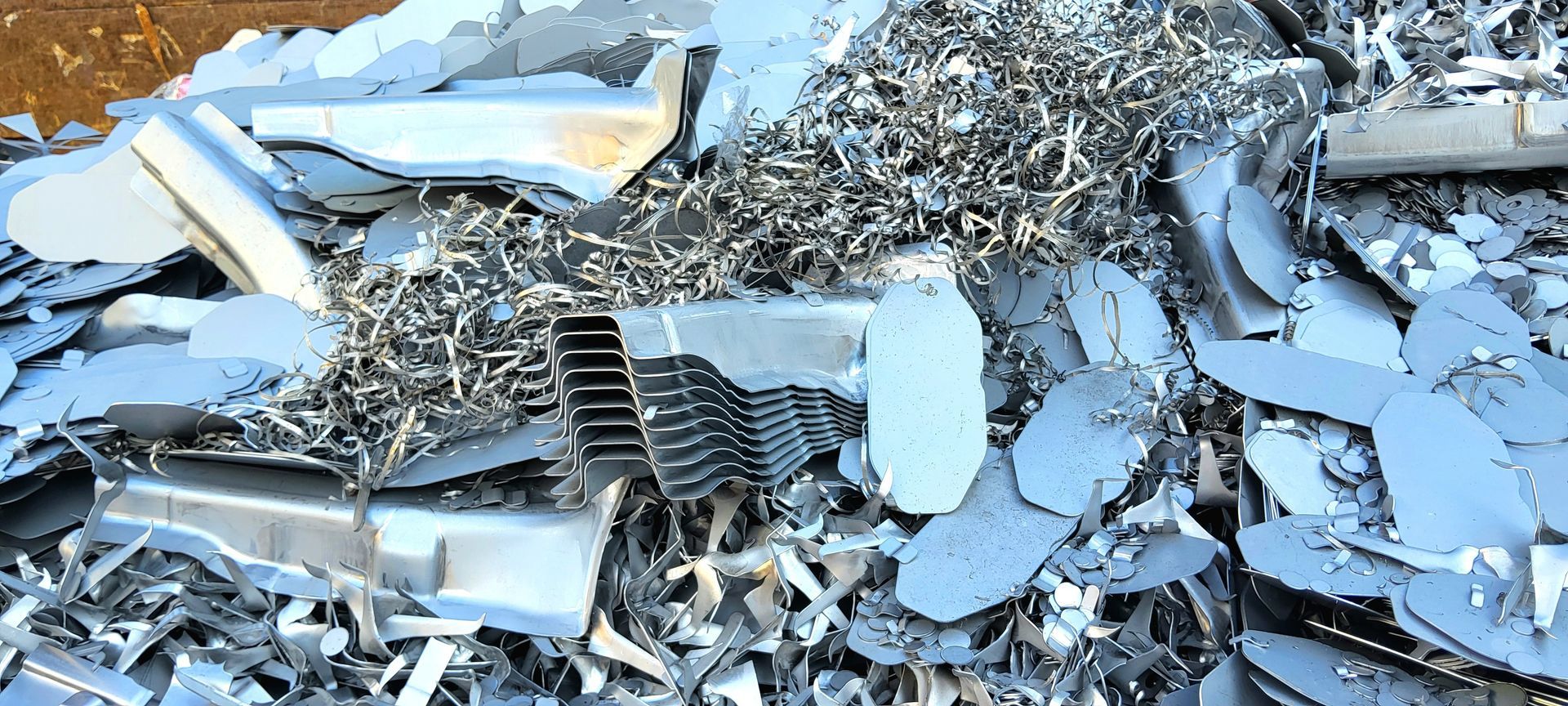 Pile of industrial scrap metal recycling materials ready for processing