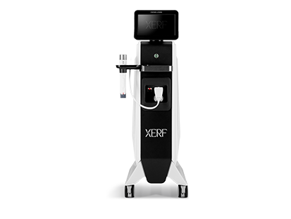A sleek, white and black medical aesthetic device with a digital display, handheld applicator, and wheels.