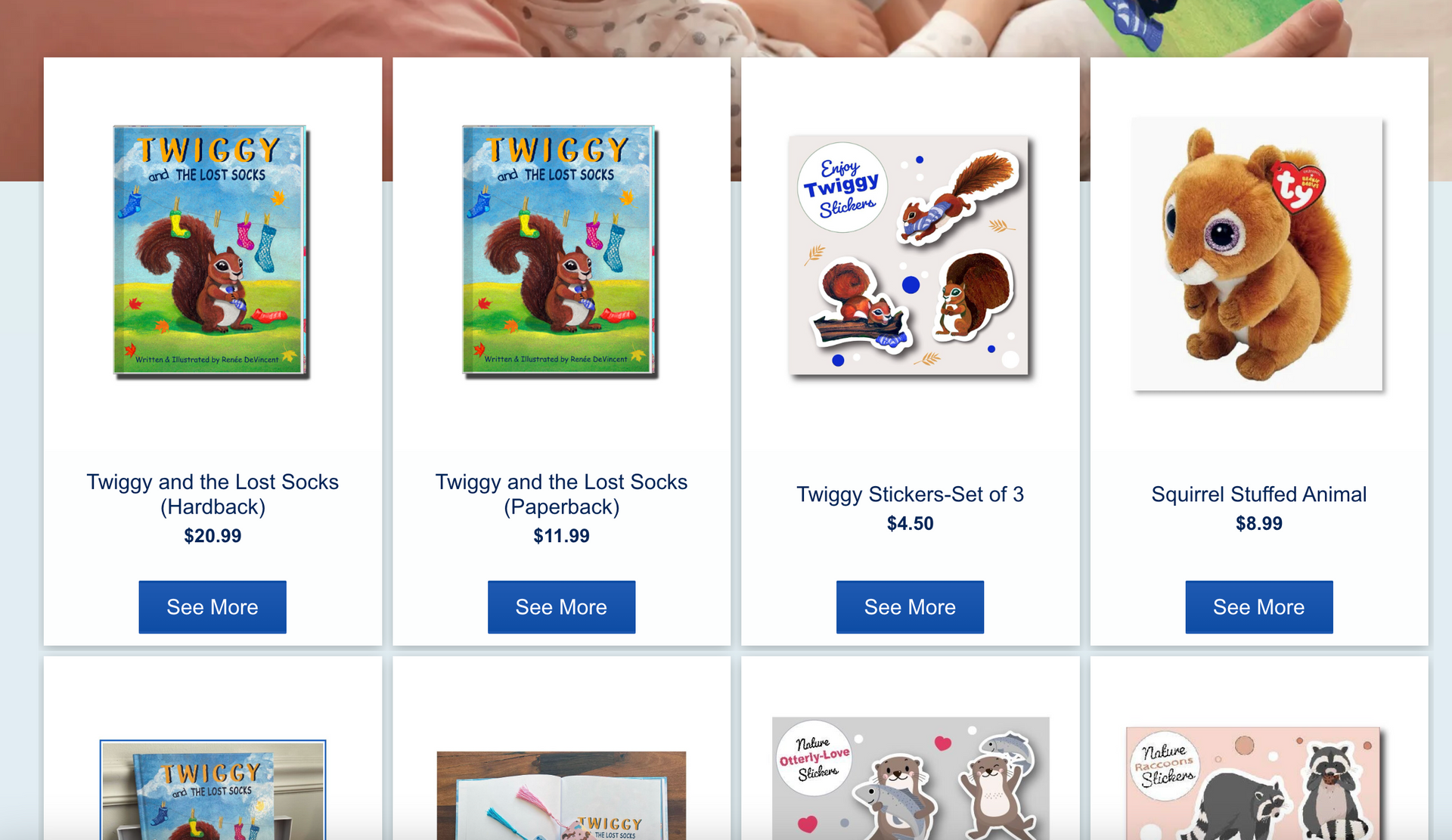 Squirrel-themed merchandise: books, stickers, and plush toy displayed in product boxes.