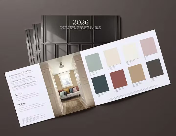 Paint color brochure open to display color swatches and a room's interior.