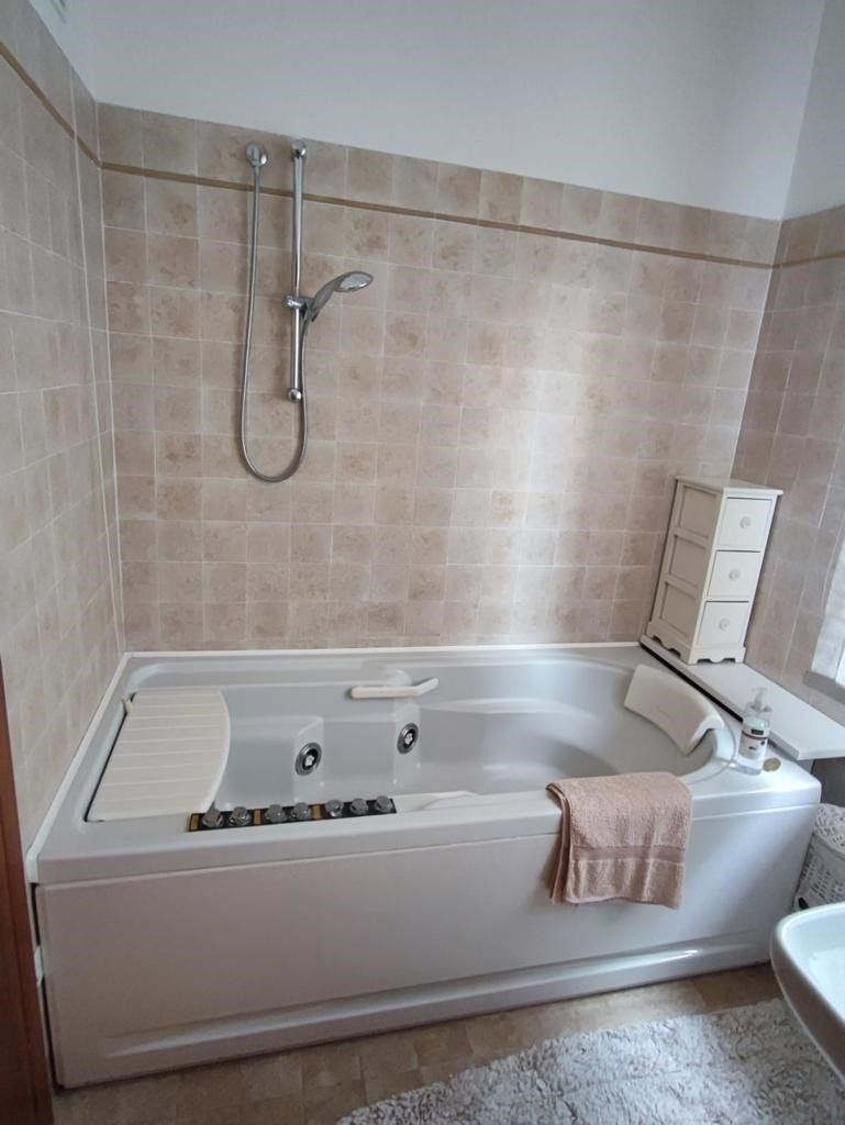bathroom with water massage