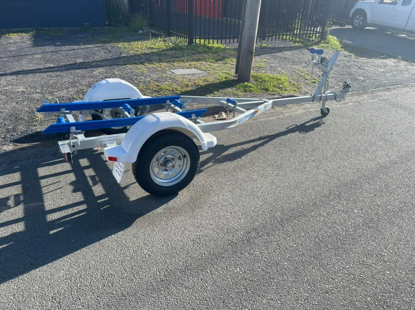A Blue and White Trailer Is Parked — Don's Marine Repairs in Woy Woy, NSW