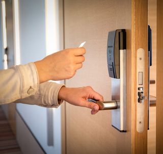 Worker Open a Door Using Key Card — Boise, ID — Baldwin Lock & Key Worker Open a Door Using Key Card — Boise, ID — Baldwin Lock & Key
