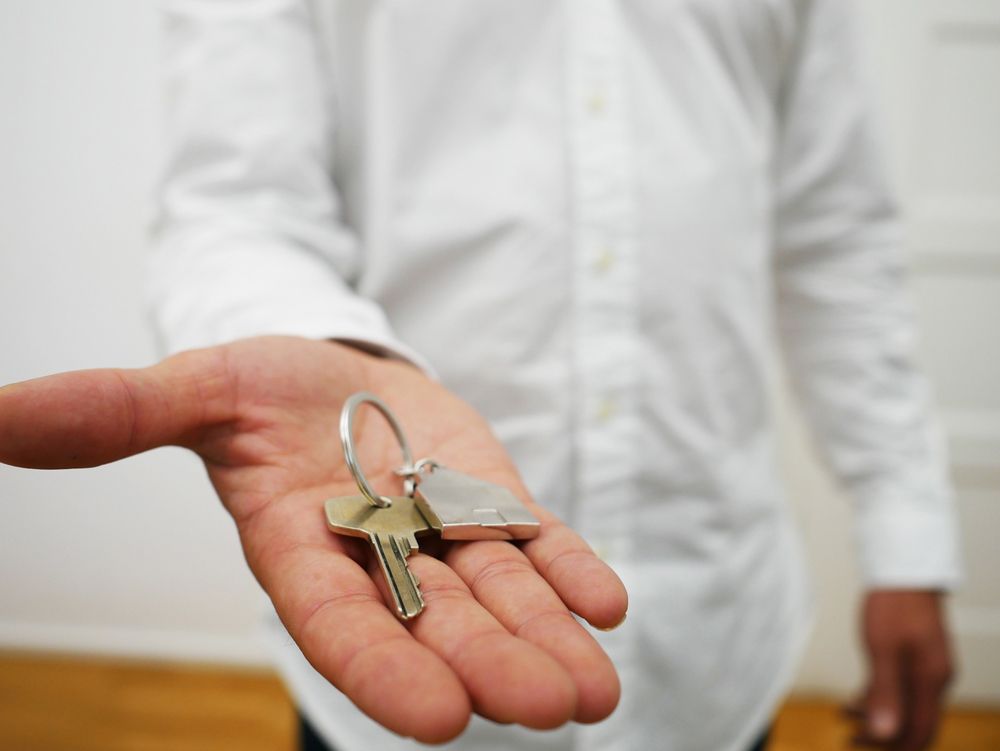 Locksmith Handing Keys in Nampa, ID