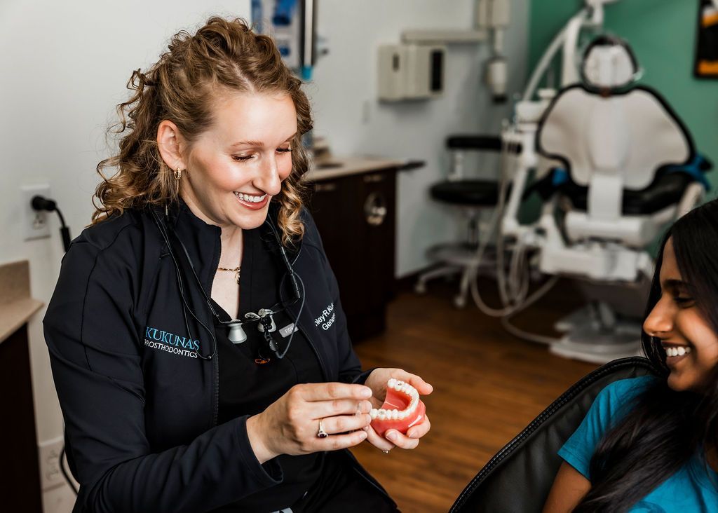 Checking Patient's Teeth — Pittsburgh, PA — Kukunas Prosthodontics
