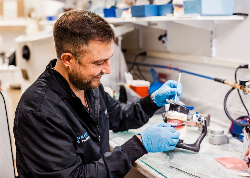 Man With New Dentures — Pittsburgh, PA — Kukunas Prosthodontics