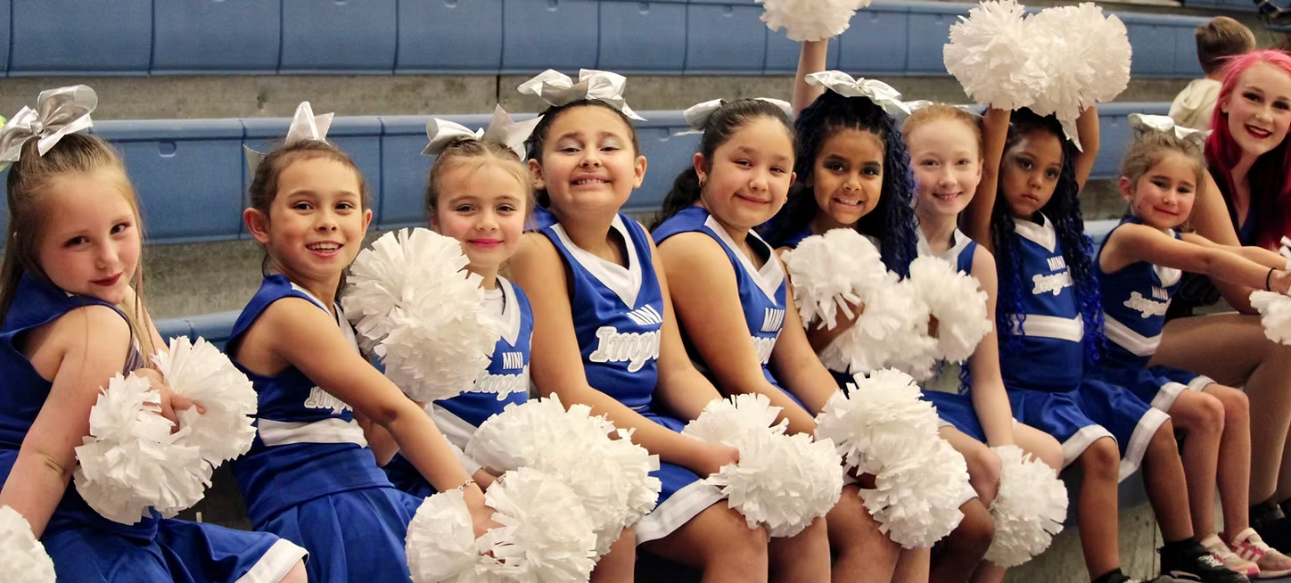 mini dancers candid team photo in uniform