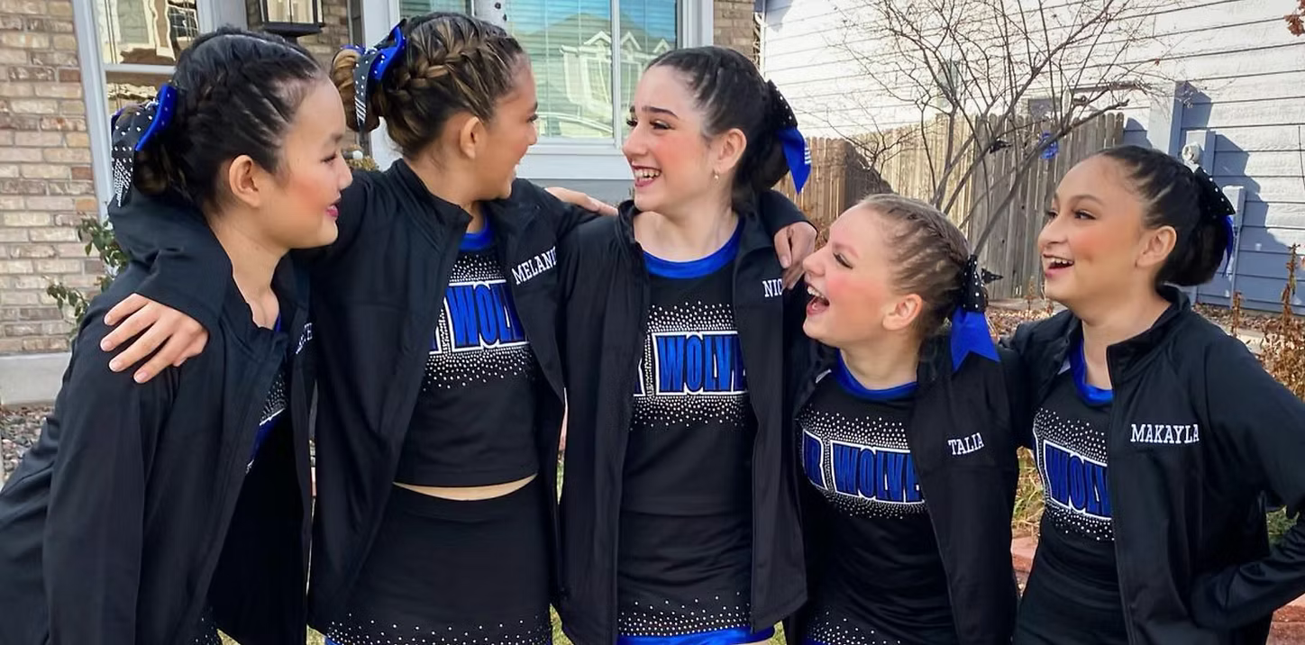 junior dancers candid team photo in uniform