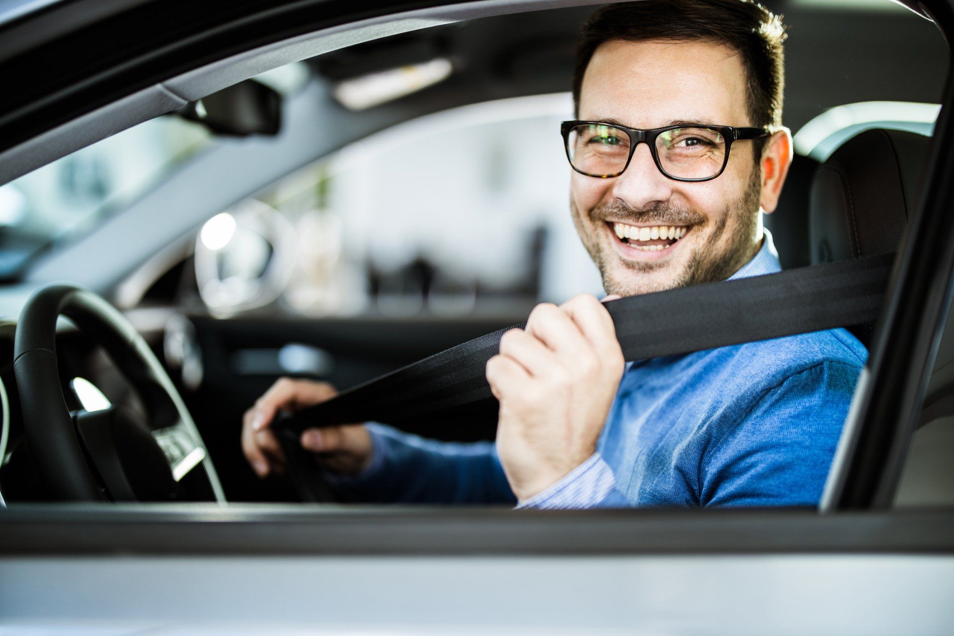 Driver Putting On Seatbelt — El Paso, TX — The Enriquez Law Firm