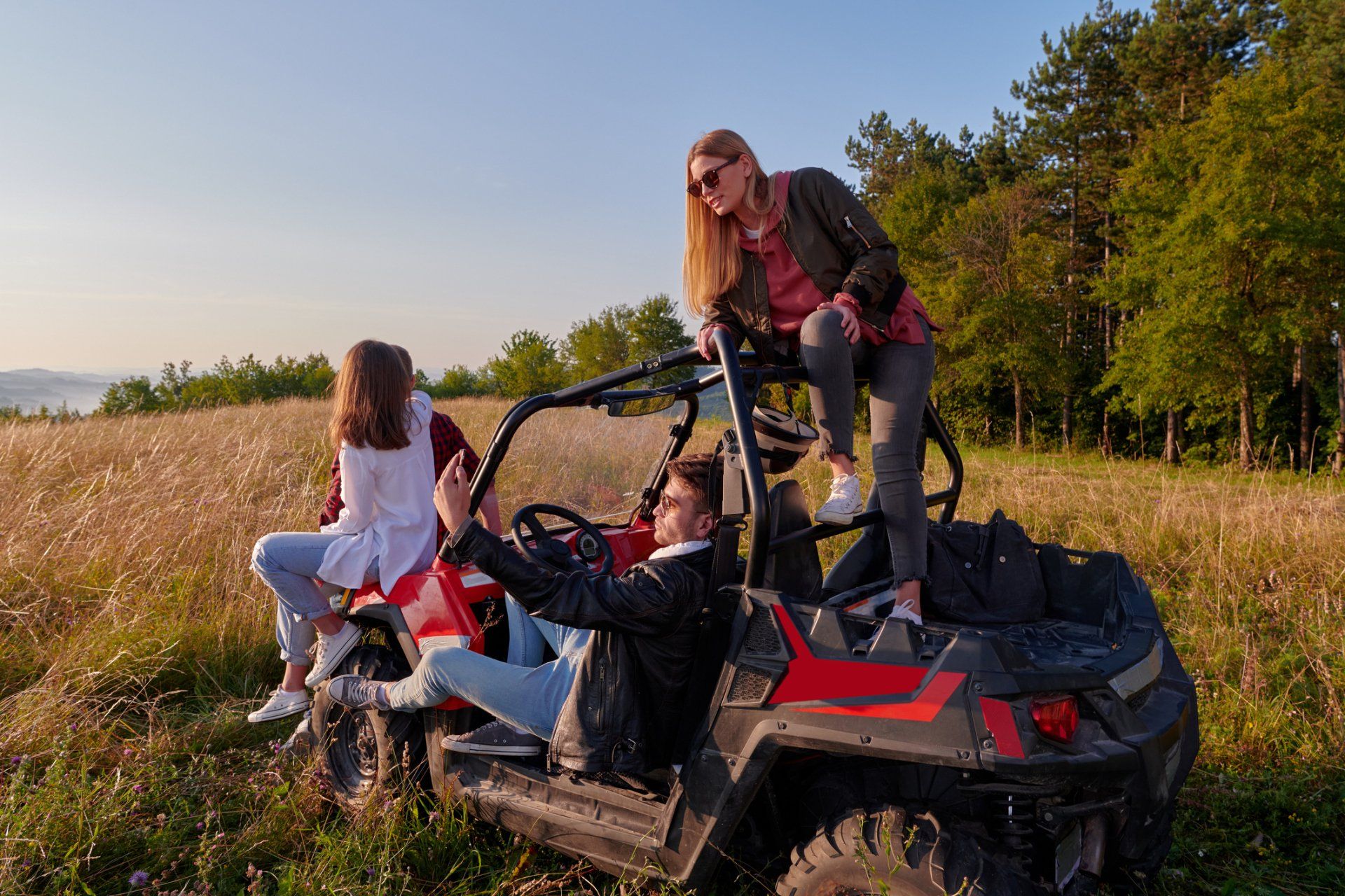 Friends Riding An ATV — El Paso, TX — The Enriquez Law Firm Friends Riding An ATV — El Paso, TX — The Enriquez Law Firm