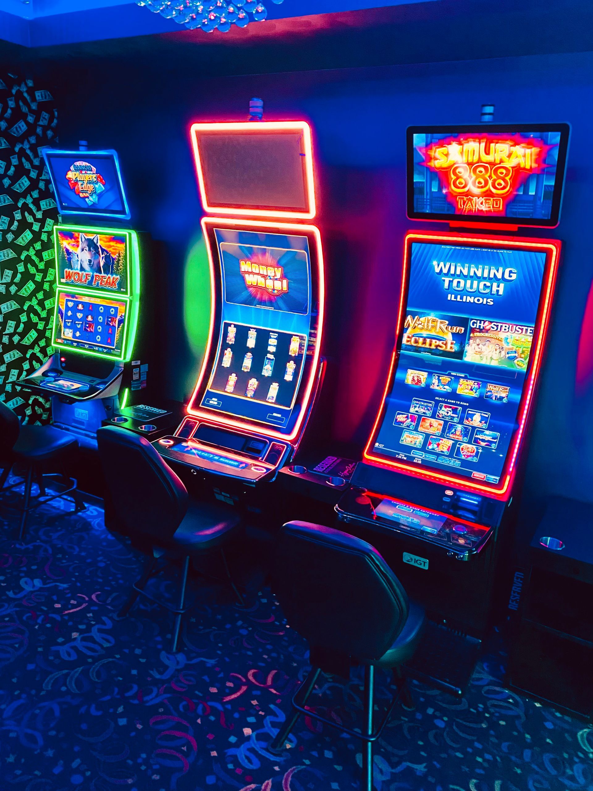 A row of slot machines with one that says thunder touch