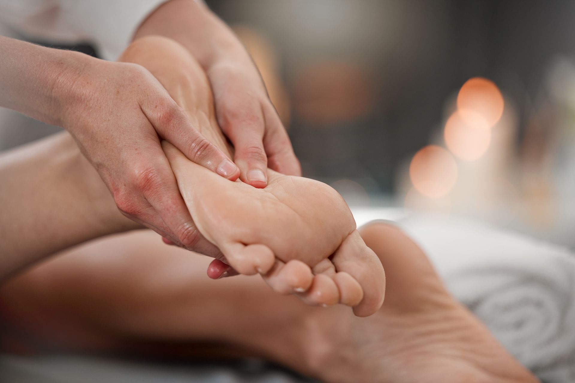 A Woman is Getting a Foot Massage at a Spa