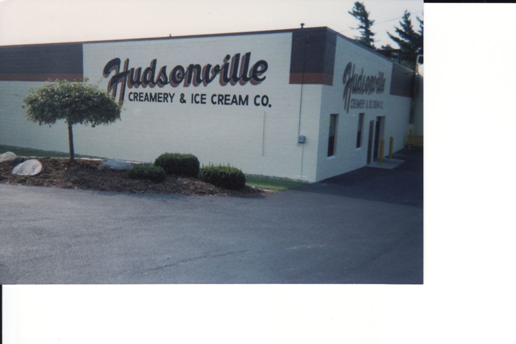 Hudsonville Creamery & Ice Cream Co. building exterior with white walls and signage