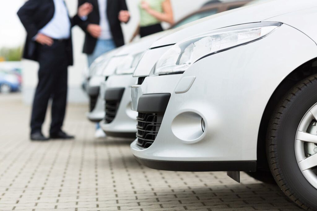Cars in a Row at a Dealership, With Potential Buyers — Fulgi's South Coast Automotive and Dismantling in Nowra, NSW