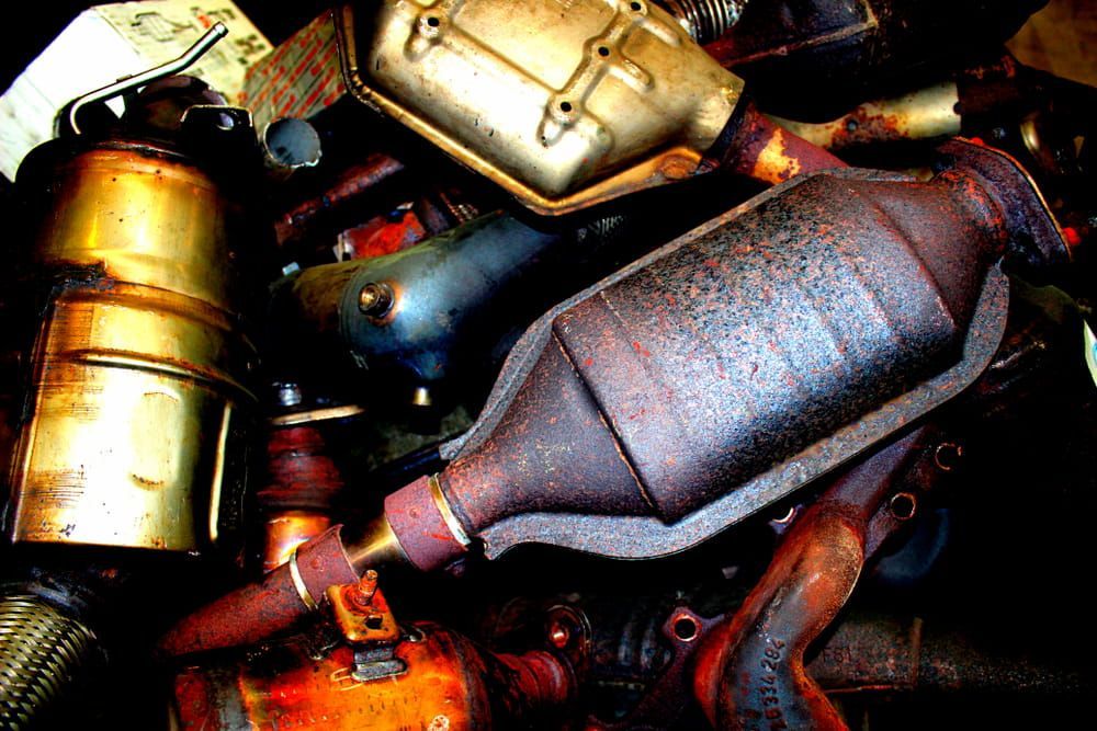 Pile of Rusty Catalytic Converters, Various Shapes — Fulgi's South Coast Automotive and Dismantling in South Nowra, NSW