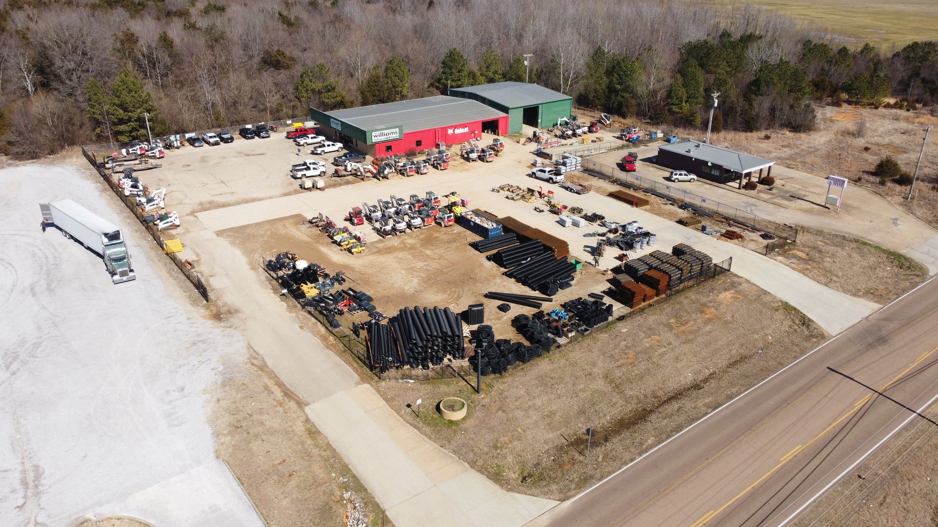 An aerial view of a junkyard filled with lots of tires.