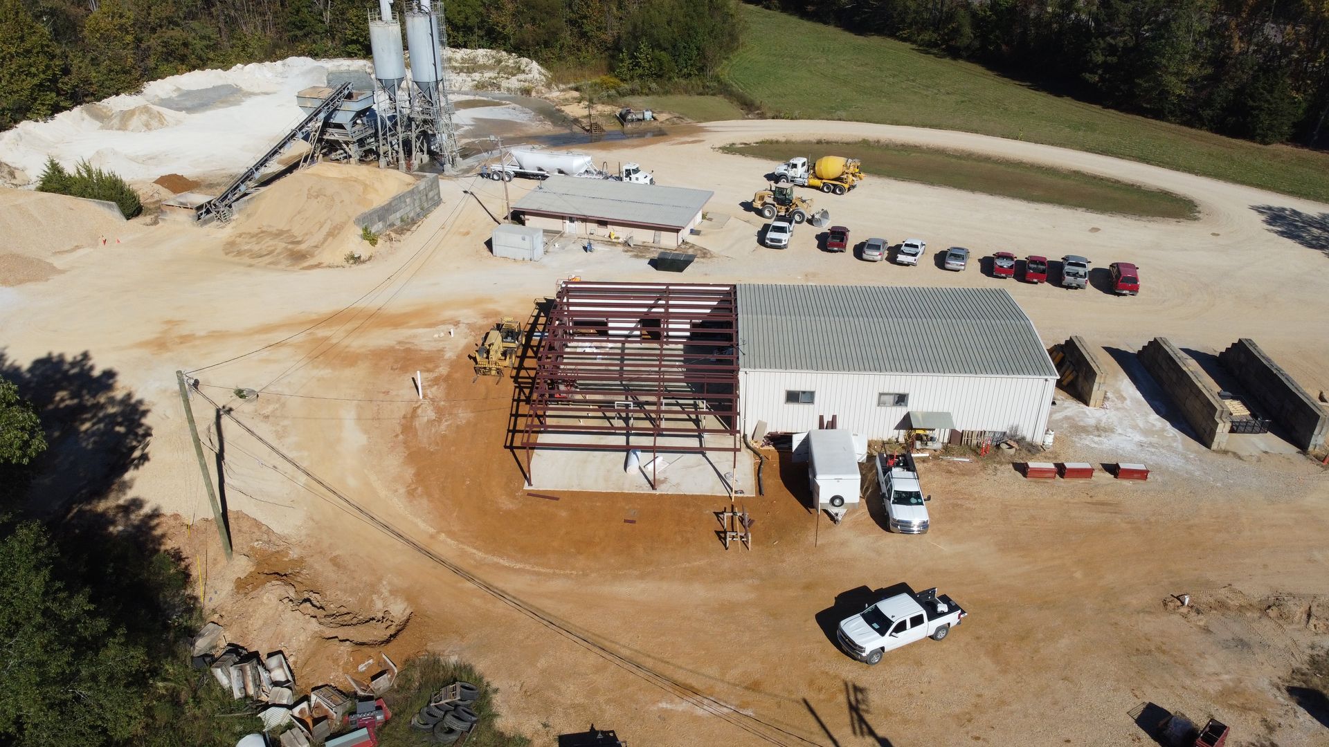 An aerial view of a construction site with a building under construction.