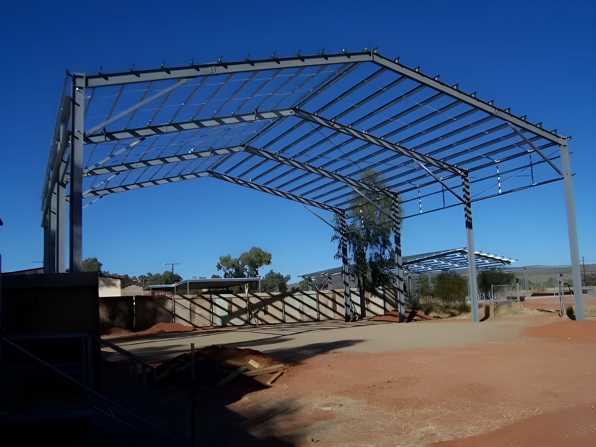 A Large Metal Structure With A Blue Sky In The Background — Sno's Welding In Ciccone, NT