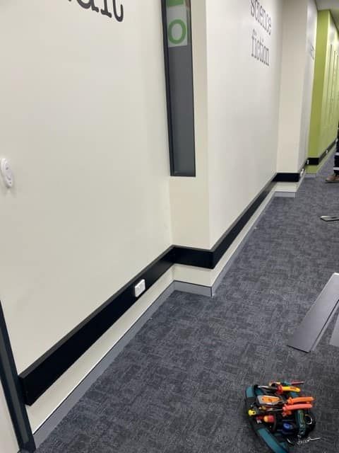 Hallway with Gray Carpet and White Walls — Bes-Elect Electrical in Taminda, NSW
