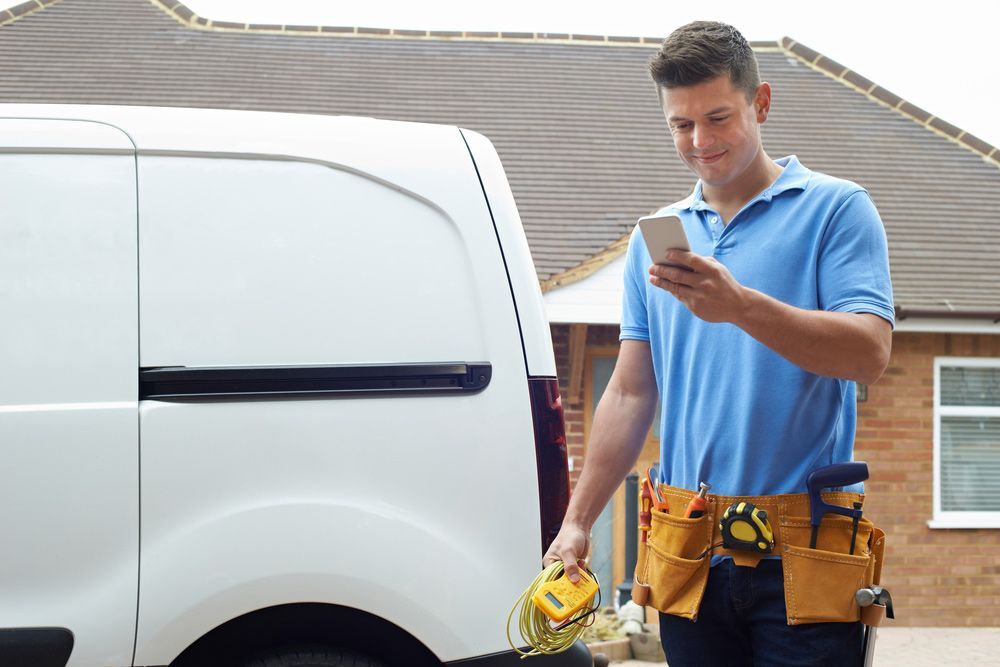 Electrician Checking Message — Electrician in Sawyers Gully NSW