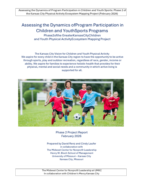 Children playing soccer on a field; report cover about children's physical activity in Kansas City.