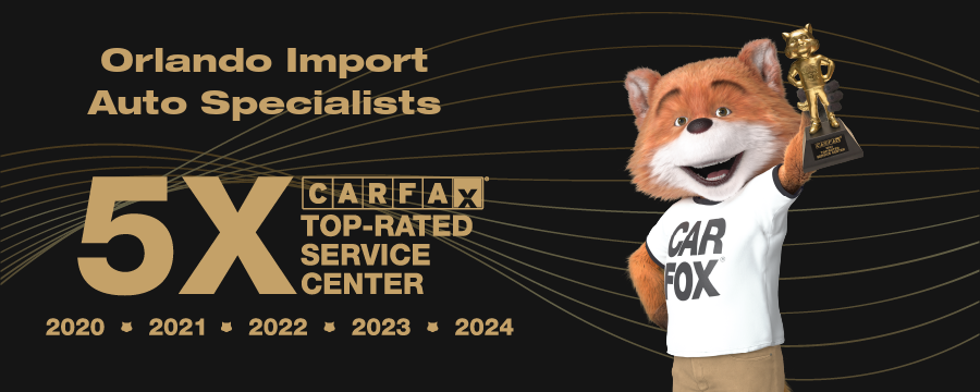 Carfax Fox holding trophy, celebrating 5X Top-Rated Service Center award from 2020-2024. Black and gold background.