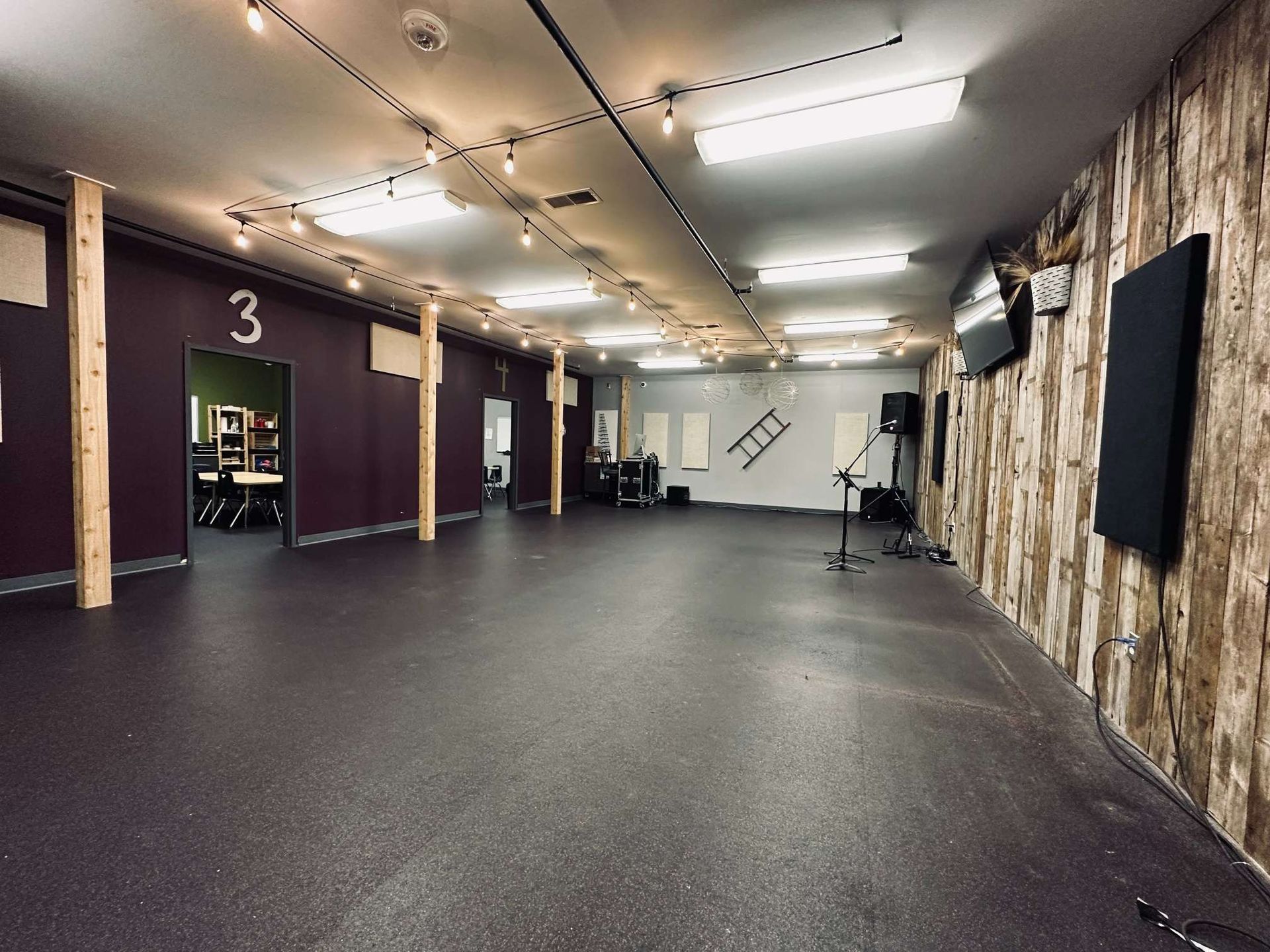 An empty room with the number 3 on the wall