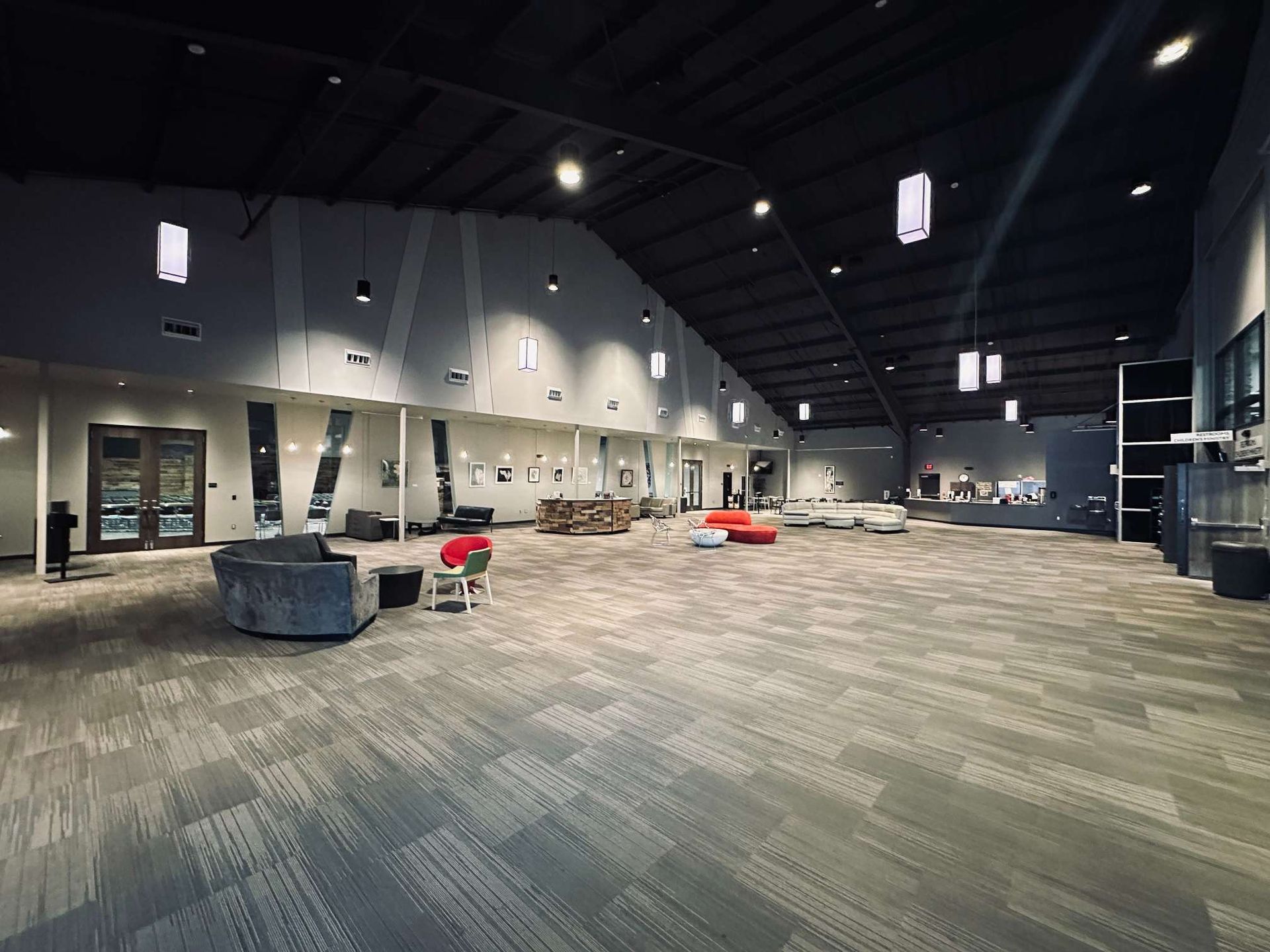 A large room with a lot of furniture in it.