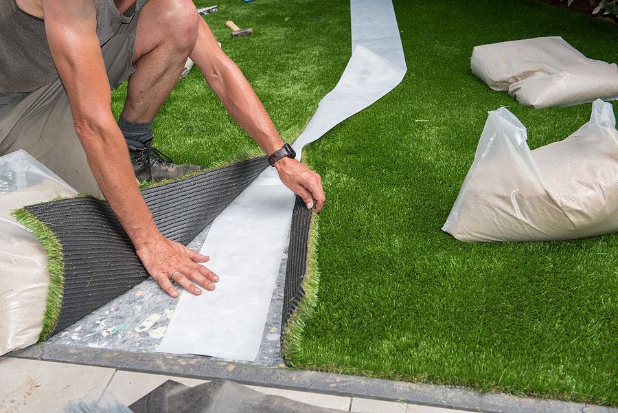 artificial lawn being installed in Pangbourne