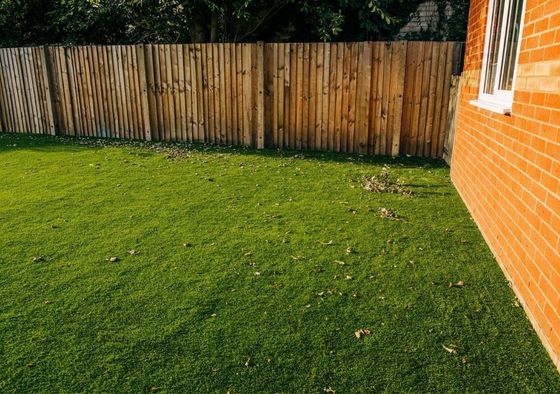Artificial grass in back garden in Tilehurst, Reading