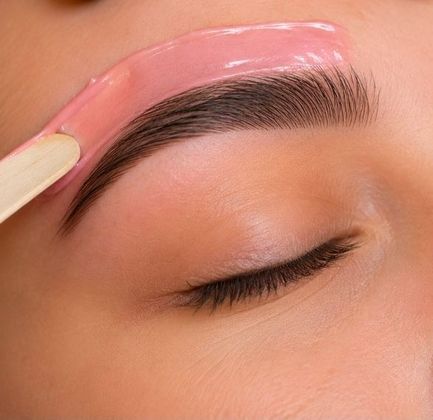Professional eyebrow waxing service at Simply Irresistible Salon in DeLand, FL