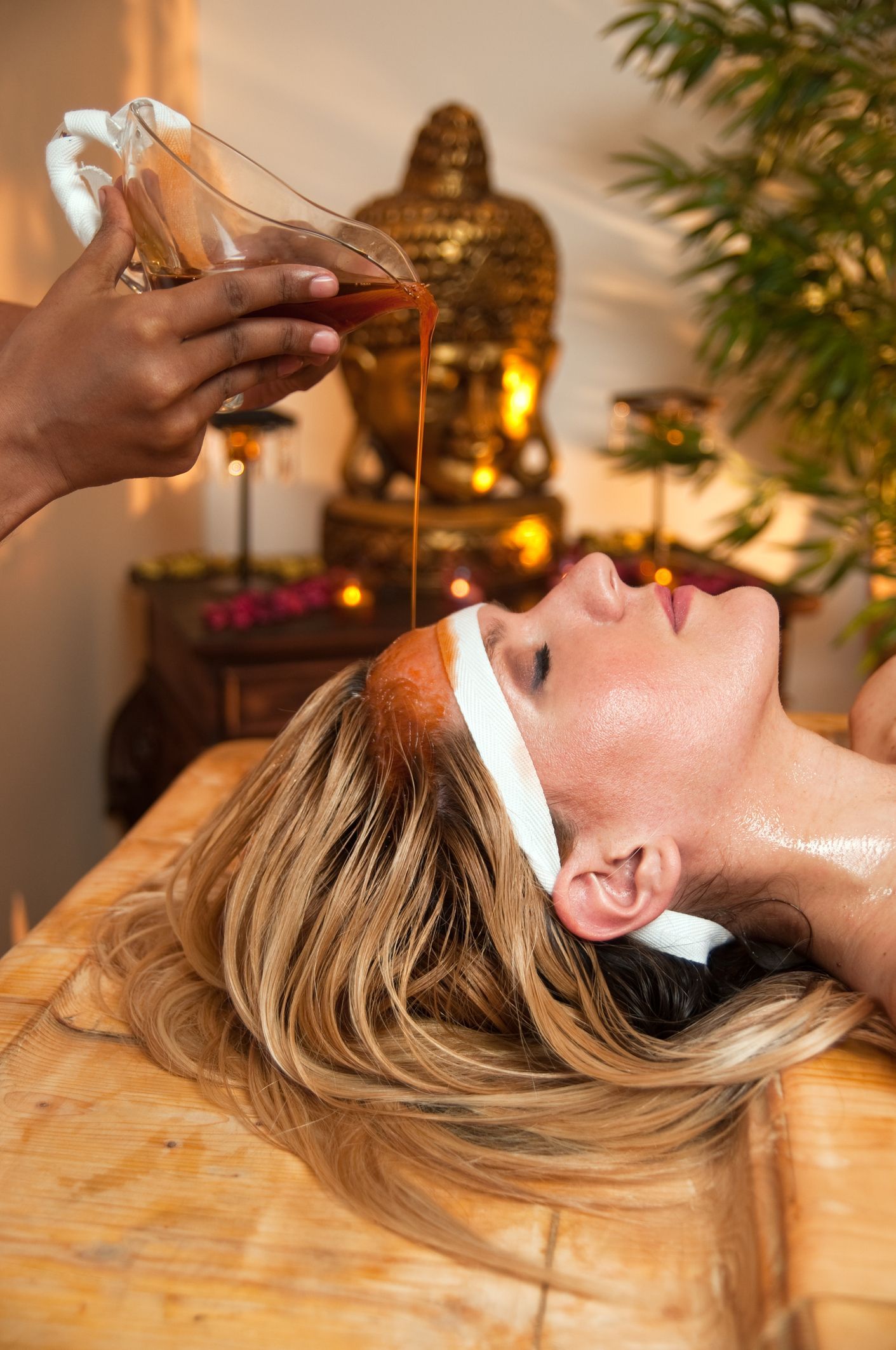 Beautician Applying Facial Cream All Over Young Woman's Forehead | Wynnum, Qld | Beauty in Style Day Spa
