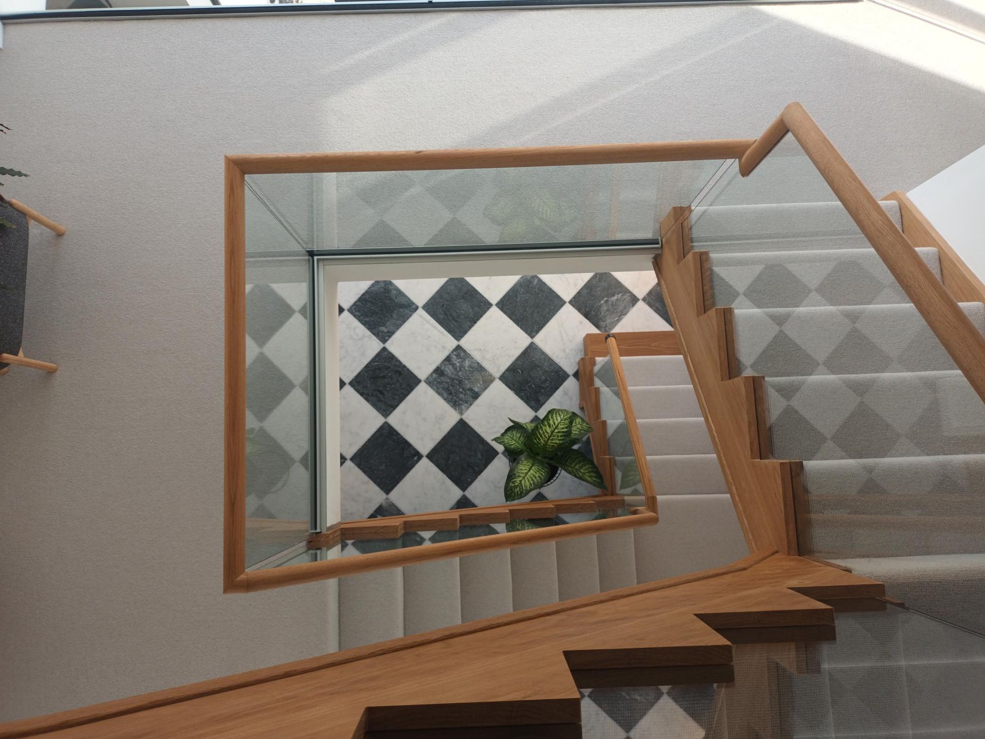 Cut string staircase, traditional staircase and glass balustrade comparisons
