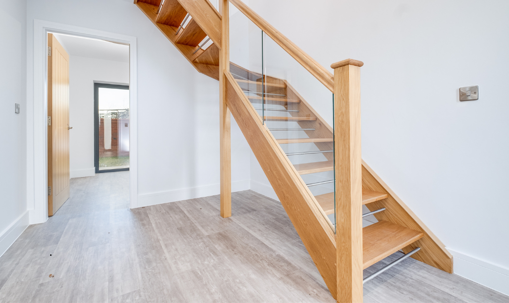 Open Tread Staircase With Glass Balustrade